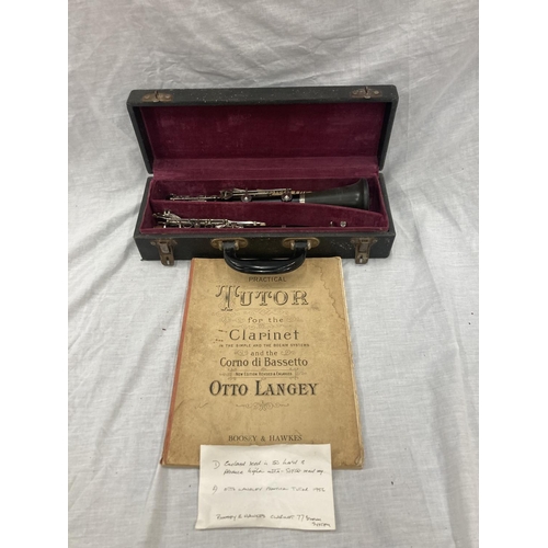 39 - A BOXED BOOSEY AND HAWKES CLARINET 77 BOEHM SYSTEM WITH SPARE REEDS AND 'PRACTICAL TUTOR FOR THE CLA... 