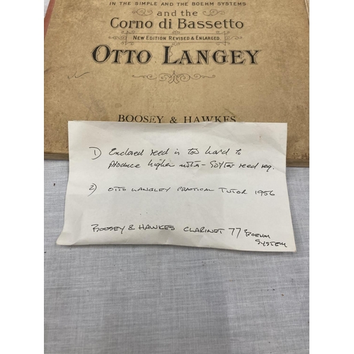 39 - A BOXED BOOSEY AND HAWKES CLARINET 77 BOEHM SYSTEM WITH SPARE REEDS AND 'PRACTICAL TUTOR FOR THE CLA... 