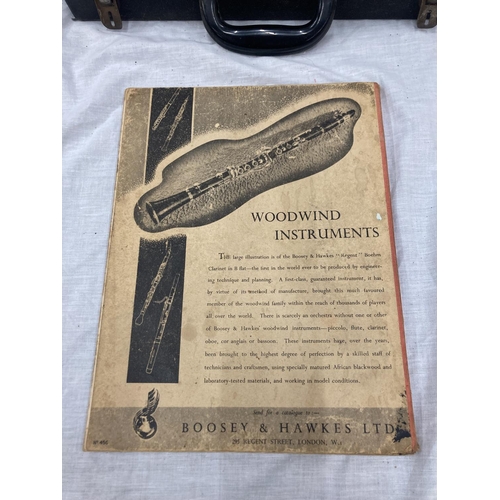 39 - A BOXED BOOSEY AND HAWKES CLARINET 77 BOEHM SYSTEM WITH SPARE REEDS AND 'PRACTICAL TUTOR FOR THE CLA... 