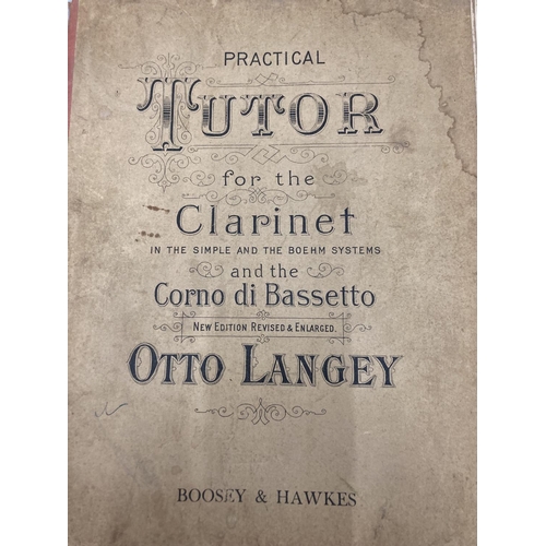 39 - A BOXED BOOSEY AND HAWKES CLARINET 77 BOEHM SYSTEM WITH SPARE REEDS AND 'PRACTICAL TUTOR FOR THE CLA... 