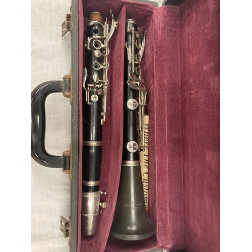 39 - A BOXED BOOSEY AND HAWKES CLARINET 77 BOEHM SYSTEM WITH SPARE REEDS AND 'PRACTICAL TUTOR FOR THE CLA... 