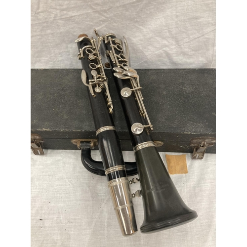 39 - A BOXED BOOSEY AND HAWKES CLARINET 77 BOEHM SYSTEM WITH SPARE REEDS AND 'PRACTICAL TUTOR FOR THE CLA... 