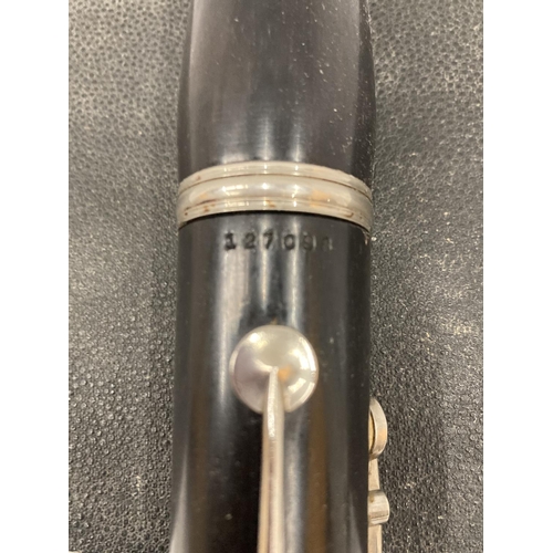 39 - A BOXED BOOSEY AND HAWKES CLARINET 77 BOEHM SYSTEM WITH SPARE REEDS AND 'PRACTICAL TUTOR FOR THE CLA... 