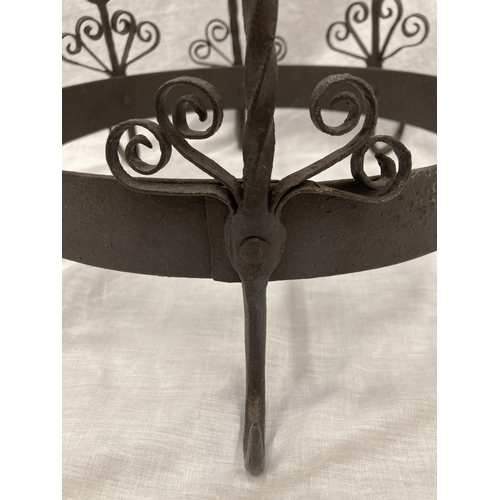 5 - A WROUGHT IRON HANGING UTENSIL HOLDER DECORATED WITH SCROLLS AND HENS HEIGHT 37CM, DIAMETER 30CM