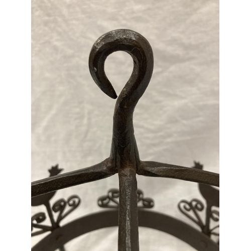 5 - A WROUGHT IRON HANGING UTENSIL HOLDER DECORATED WITH SCROLLS AND HENS HEIGHT 37CM, DIAMETER 30CM