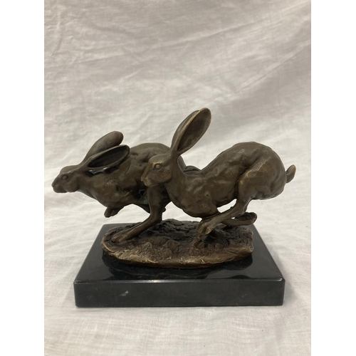 8 - A SIGNED BRONZE OF HARES RUNNING ON A MARBLE PLINTH HEIGHT 12CM, LENGTH 15CM