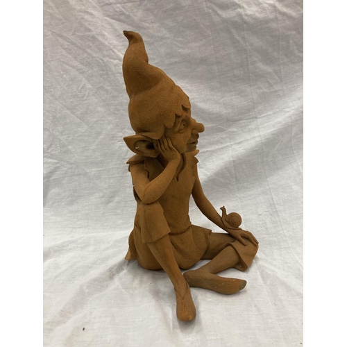 44 - A CAST RUSTY GARDEN PIXIE - HEIGHT 37CM