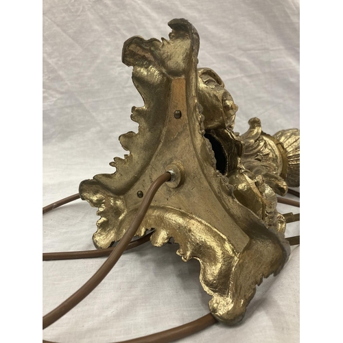 45 - A BRASS TABLE LAMP WITH PINEAPPLE STYLE DECORATION - HEIGHT 62CM