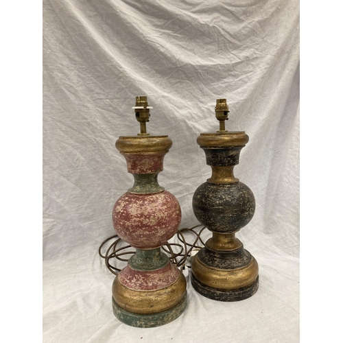 46 - A PAIR OF WOODEN TABLE LAMPS PAINTED BLACK AND GOLD AND RED AND GOLD - HEIGHT 47CM