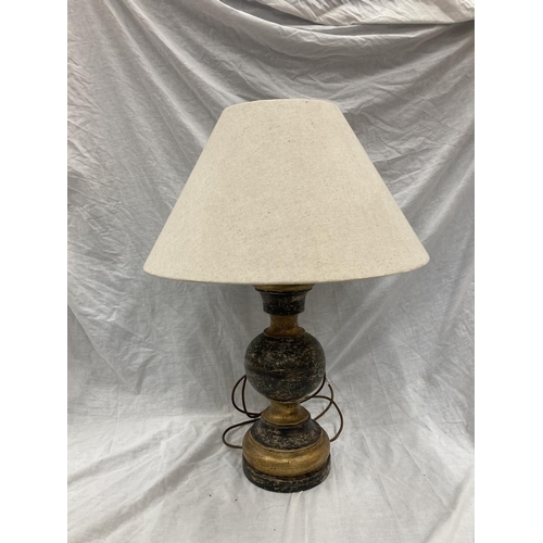 46 - A PAIR OF WOODEN TABLE LAMPS PAINTED BLACK AND GOLD AND RED AND GOLD - HEIGHT 47CM