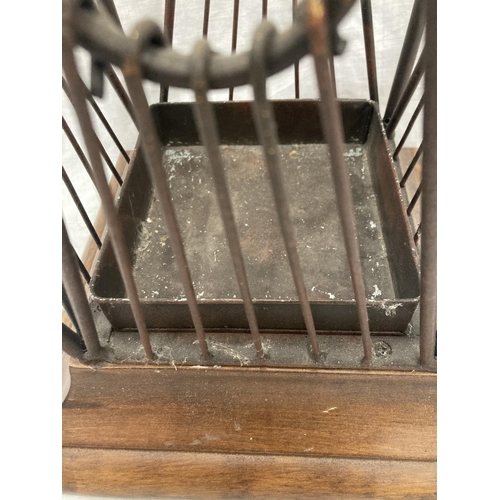 47 - A VINTAGE STYLE WOOD AND WROUGHT IRON UMBRELLA STAND