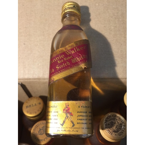 397 - A MIXTURE OF MINIATURES TO INCLUDE MAINLY WHISKEY SOME OF WHICH ARE JOHNNY WALKER RED LABEL, BUSHMIL... 