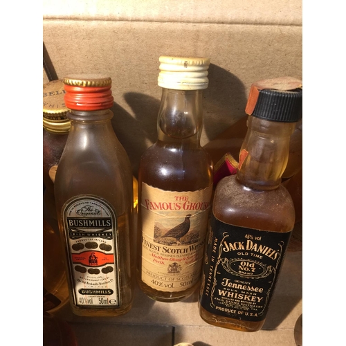 397 - A MIXTURE OF MINIATURES TO INCLUDE MAINLY WHISKEY SOME OF WHICH ARE JOHNNY WALKER RED LABEL, BUSHMIL... 