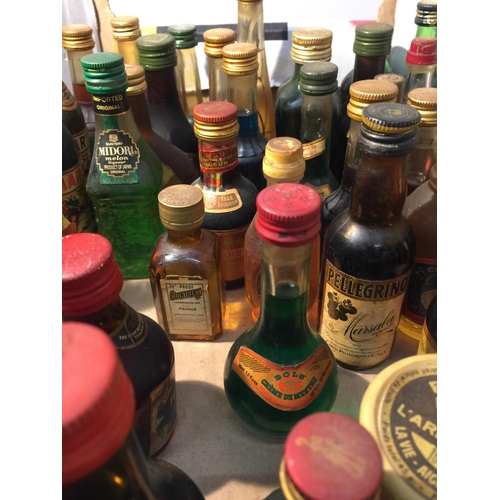 398 - A MIXTURE OF MINIATURES TO INCLUDE MAINLY LIQUER'S SUCH AS BLUE CURACA, CHERRY BRANDY, CAMPARI, DRAM... 