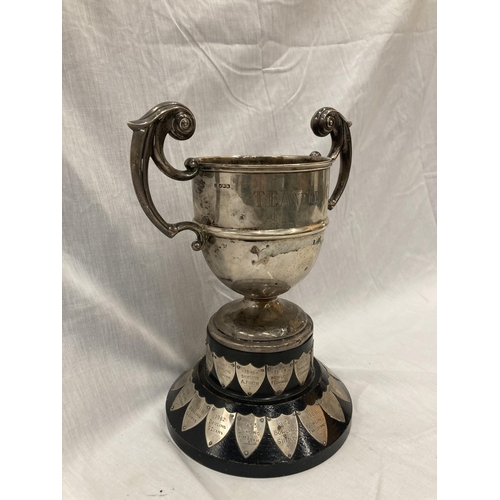 12 - A HALLMARKED SHEFFIELD SILVER TROPHY WITH SHIELDS HEIGHT 32CM TO TOP OF THE HANDLE GROSS WEIGHT 1436... 