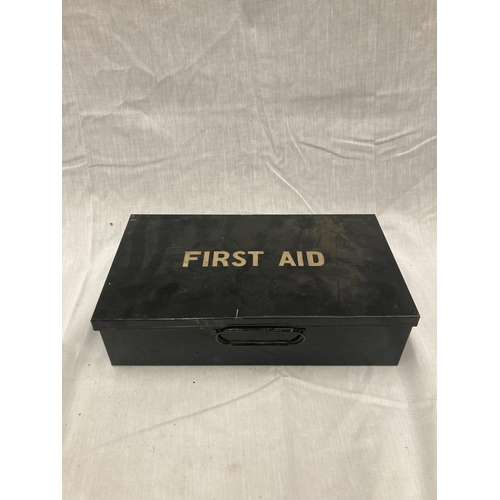 21 - A VINTAGE FIRST AID KIT IN A BLACK TIN WITH ORIGINAL CONTENTS