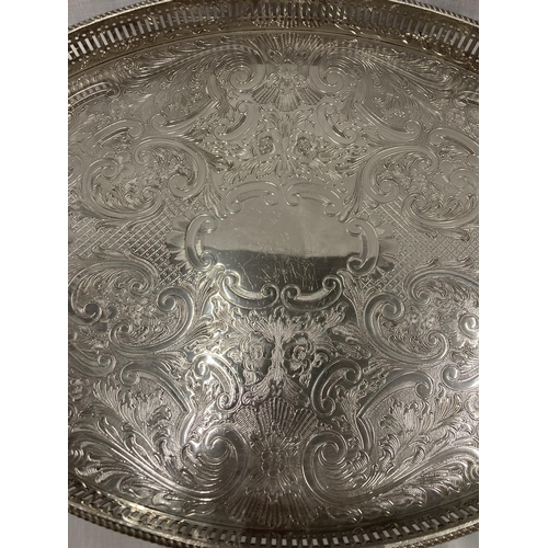 25 - A LARGE SILVER PLATED TWIN HANDLED TRAY