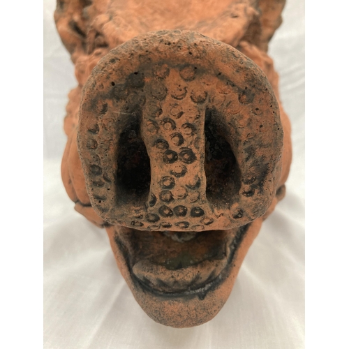 3 - A TERRACOTTA WALL MOUNTED BUST OF A WILD BOAR LENGTH 31 CM HEIGHT 30 CM