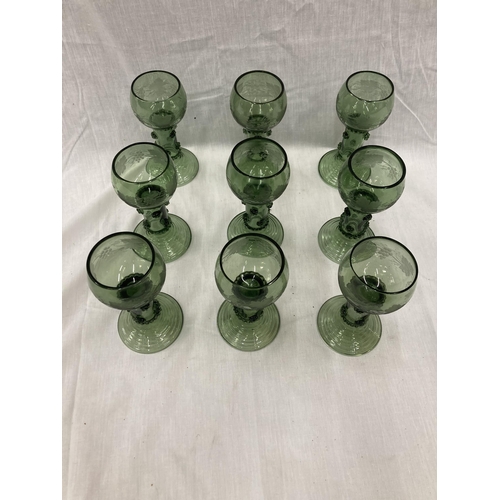 30 - NINE AUSTRIAN CUT GLASS HOCK GLASSES CIRCA 1800 WITH ETCHED GRAPE VINE DECORATION