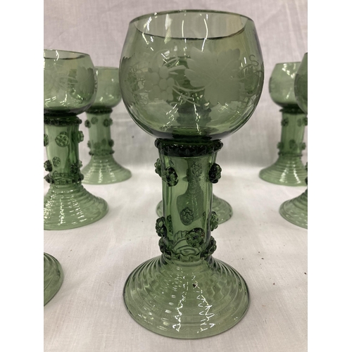 30 - NINE AUSTRIAN CUT GLASS HOCK GLASSES CIRCA 1800 WITH ETCHED GRAPE VINE DECORATION