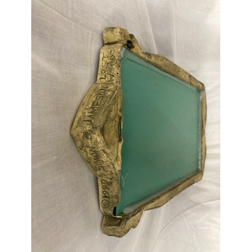 32 - A STONE FRAMED GOTHIC WINDOW STYLE MIRROR