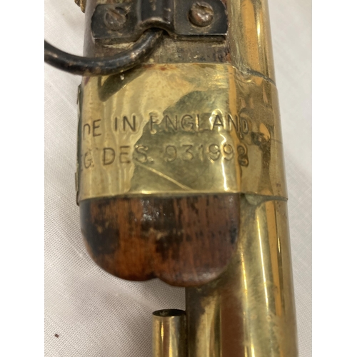 6 - A DECORATIVE ORNAMENTAL BRASS MUSKET