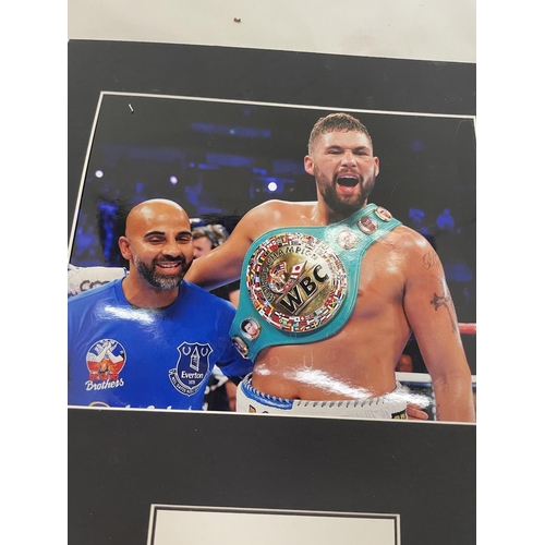 103 - A MOUNTED PHOTOGRAPH OF WBC CHAMPION BOXER TONY BELLEW WITH TRAINER DAVE COLDWELL COMPLETE WITH AUTO... 