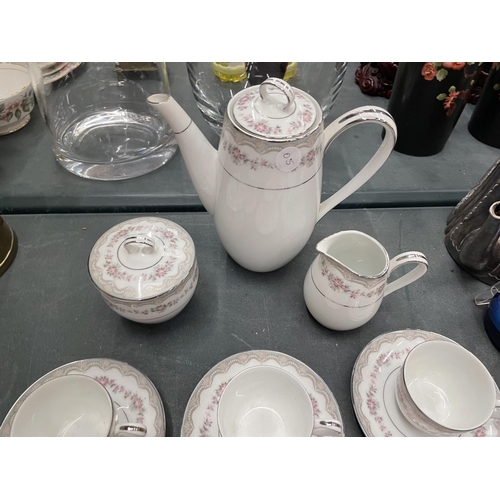 129 - A TWENTY NINE PIECE PORCELAIN NORITAKE COFFEE SET TO INCLUDE CUPS, SAUCERS, COFFEE POT, CREAM JUG AN... 