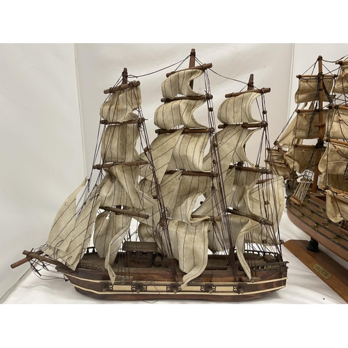 137 - TWO VINTAGE WOODEN MODELS GALLEONS