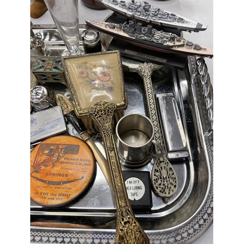 138 - A SILVER PLATED TRAY CONTAINING A VARIETY OF COLLECTABLES TO INCLUDE TIN  PLATE TOYS, MIRROR AND BRU... 