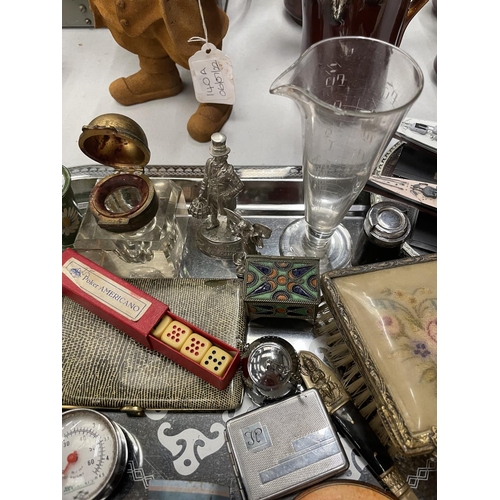 138 - A SILVER PLATED TRAY CONTAINING A VARIETY OF COLLECTABLES TO INCLUDE TIN  PLATE TOYS, MIRROR AND BRU... 