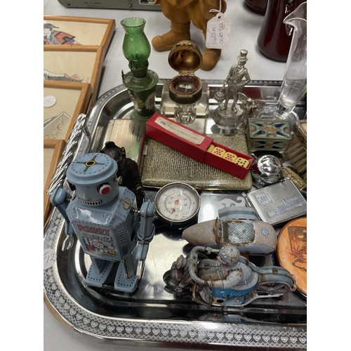 138 - A SILVER PLATED TRAY CONTAINING A VARIETY OF COLLECTABLES TO INCLUDE TIN  PLATE TOYS, MIRROR AND BRU... 