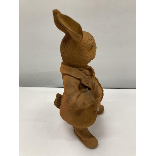 140A - A CAST MR RABBIT WITH A RUST FINISH HEIGHT 26CM