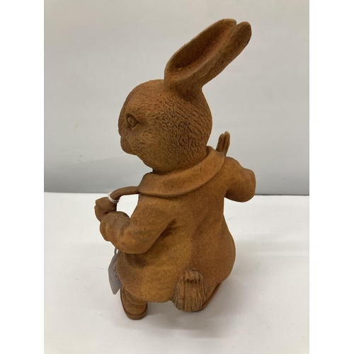 140A - A CAST MR RABBIT WITH A RUST FINISH HEIGHT 26CM