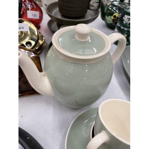 147 - A VINTAGE PALE GREEN AND CREAM VILLEROY AND BOCH PART TEA SET TO INCLUDE TEAPOT, CREAM JUG, CUPS AND... 