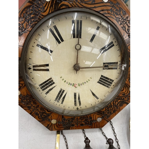 159 - A WOODEN AND POKERWORK HEXAGONAL WALL CLOCK WITH PENDULUM AND WEIGHTS