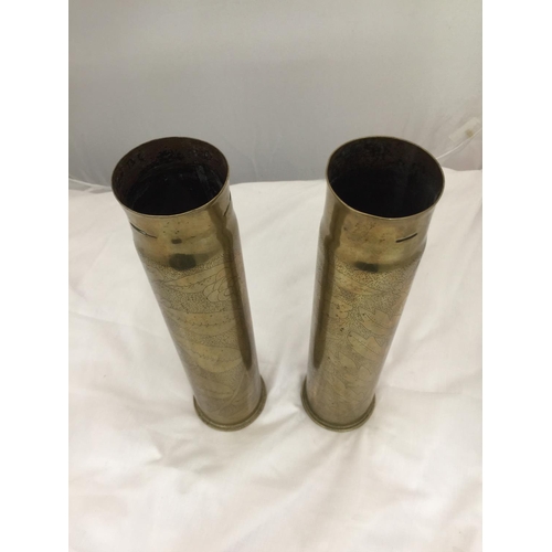 215 - A PAIR OF WW1 TRENCH ART SHELL VASES HEIGHT 30CM