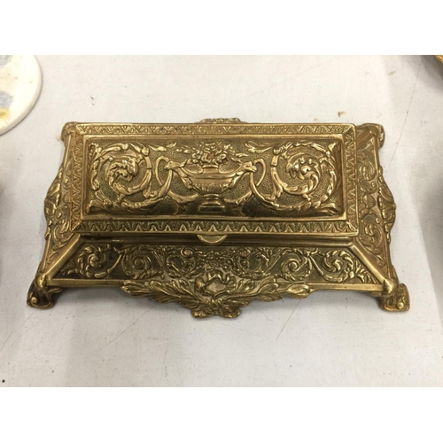 223 - A BRASS STAMP BOX WITH ORNATE STYLE DECORATION