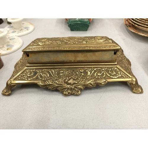 223 - A BRASS STAMP BOX WITH ORNATE STYLE DECORATION