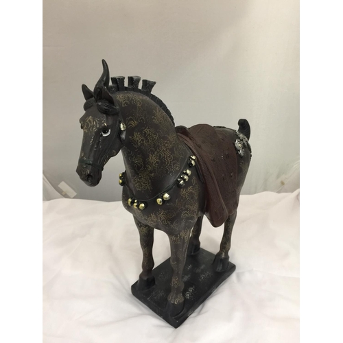 229 - A DECORATIVE TANG HORSE H:35CM