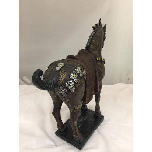 229 - A DECORATIVE TANG HORSE H:35CM