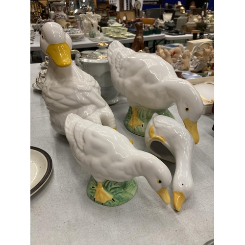 276 - FOUR CERAMIC DUCK FIGURES OF GRADUATING SIZES