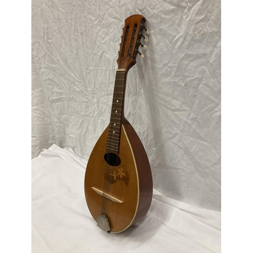 296 - A WOODEN MANDOLIN