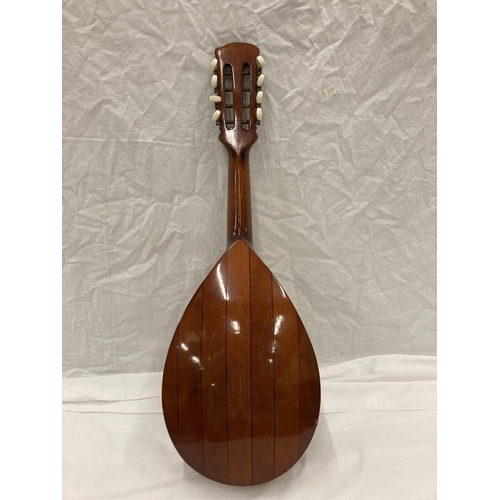 296 - A WOODEN MANDOLIN