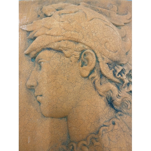 42 - A TERRACOTTA PLAQUE OF A ROMAN GUARD 32CM X 46CM