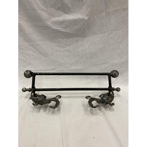 43 - A DECORATIVE WROUGHT IRON WALL MOUNTED RACK/RAIL