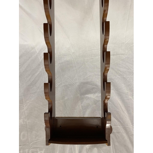 45 - A MAHOGANY VENEERED DENIX GUN RACK FOR TWELVE GUNS