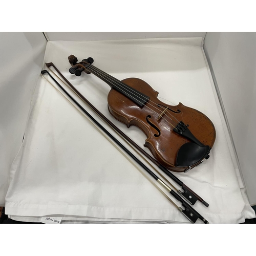 450 - A VIOLIN WITH TWO BOWS AND ACCESORIES IN A FITTED CASE