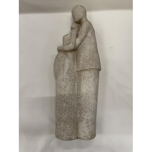 452 - A STONEWARE FIGURINE OF A MAN HOLDING A PREGNANT LADY HEIGHT 38CM