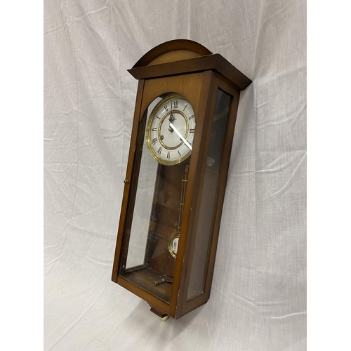 45A - A MAHOGANY CASED WALL CLOCK